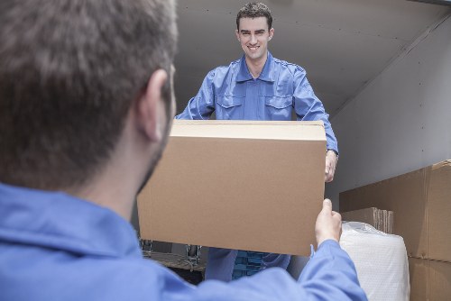 Professional packing team handling boxes at Surrey storage