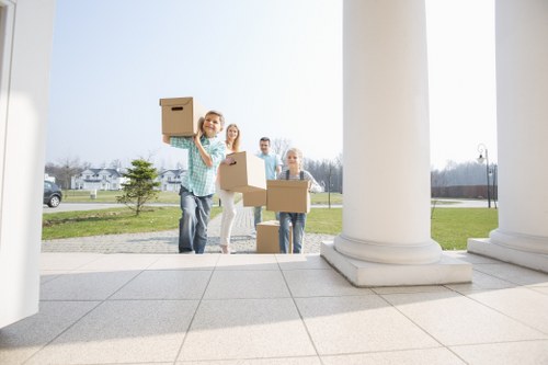 Professional movers loading a truck in Surrey