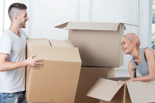 Removalists organizing and storing household items efficiently